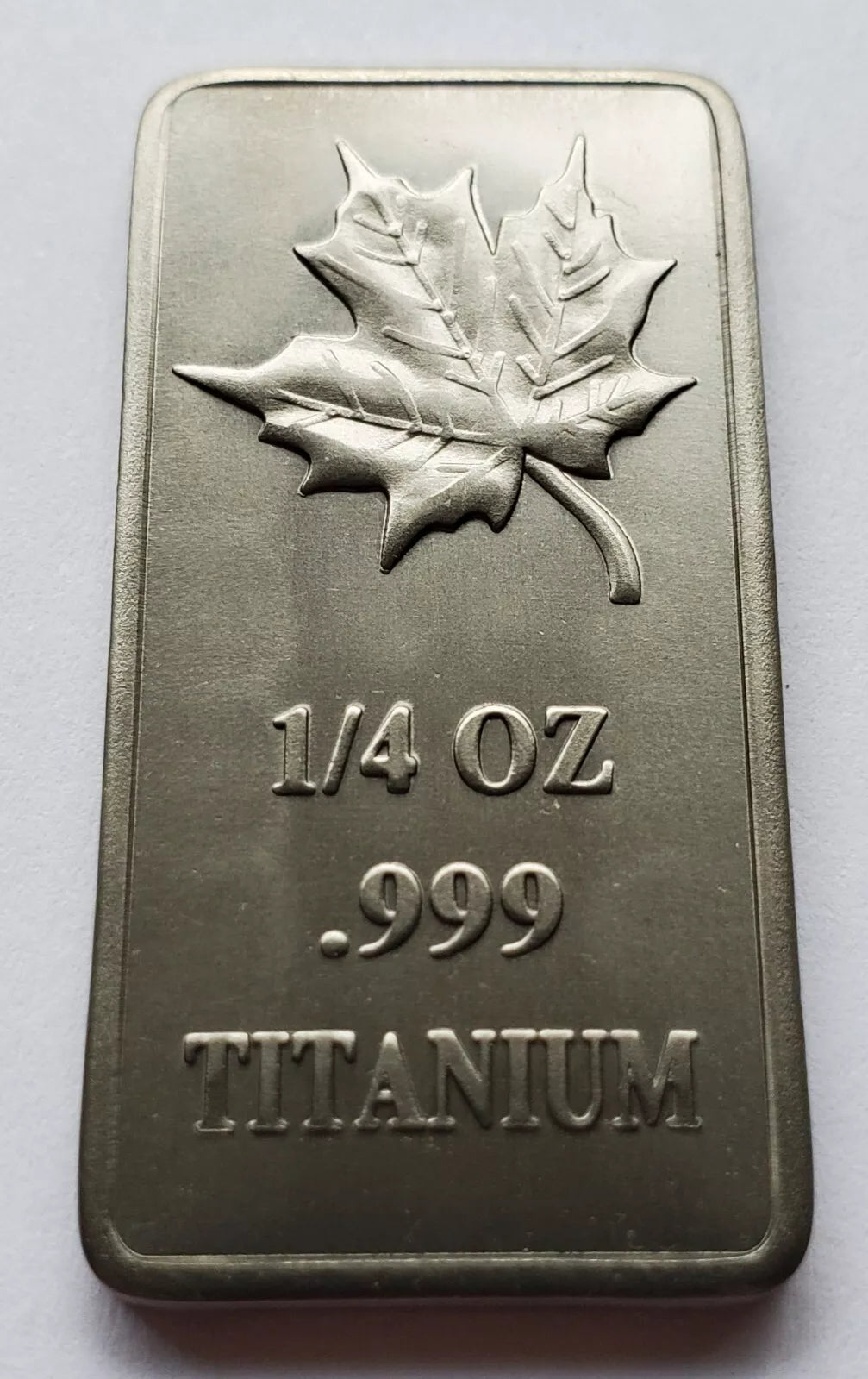 1/4 UNZE TITANIUM BARREN - KANADA MAPLE LEAF