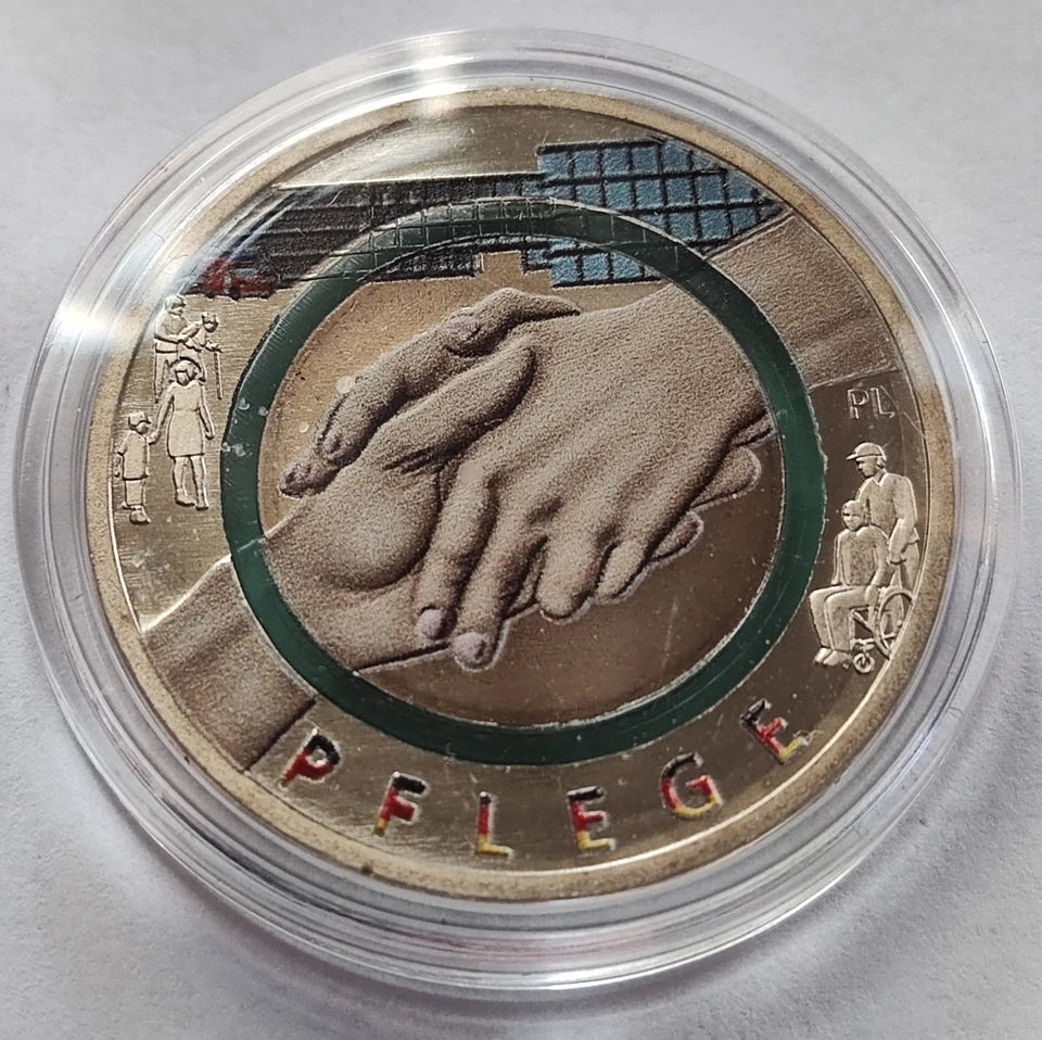 10 EURO MÜNZE - PFLEGE DIENST 2022 - POLYMERRING - KOLORIERT